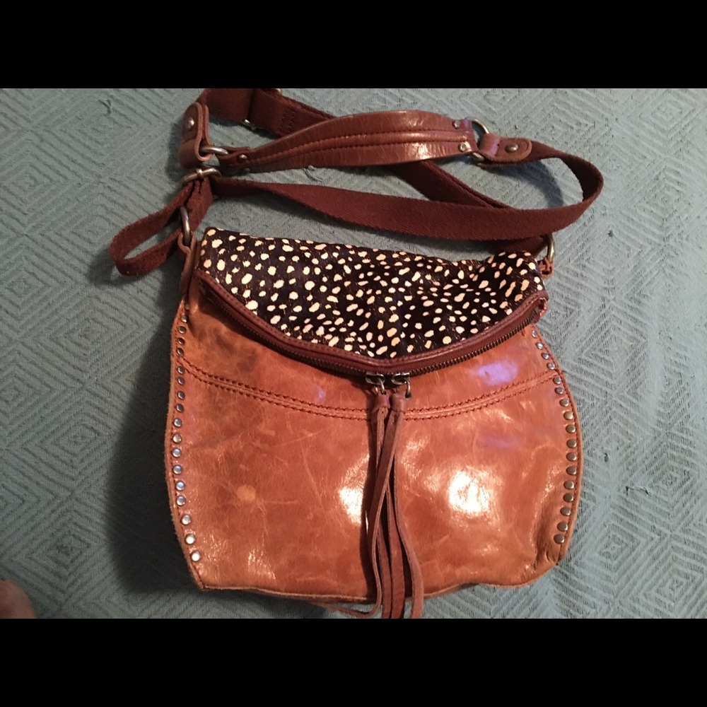 The Sak saddle crossbody